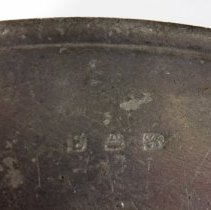 pewter charger - maker's mark close-up